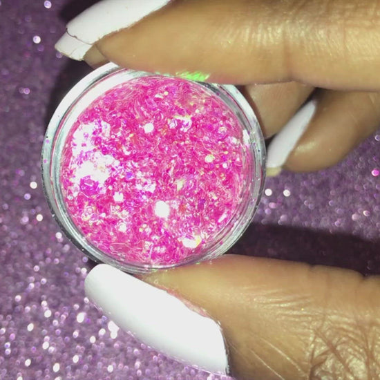 This glitter is called Sweetheart and is part of the super chunky glitter collection. It consists of pink glitter with an iridescent sparkle. Sweetheart can be used for your face, body, hair and nails. Comes in 5g and 10g jars. **Glitter will be discontinued once sold out**  