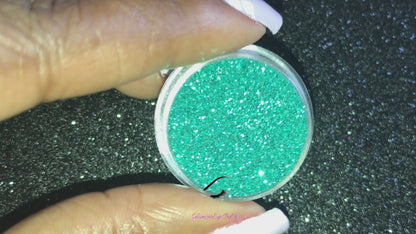 This glitter is called Paradise and is part of the simple glitter collection. It consists of metallic teal simple glitter. Paradise can be used for your face, body, hair and nails. Comes in 5g jars only. **Glitter will be discontinued once sold out**