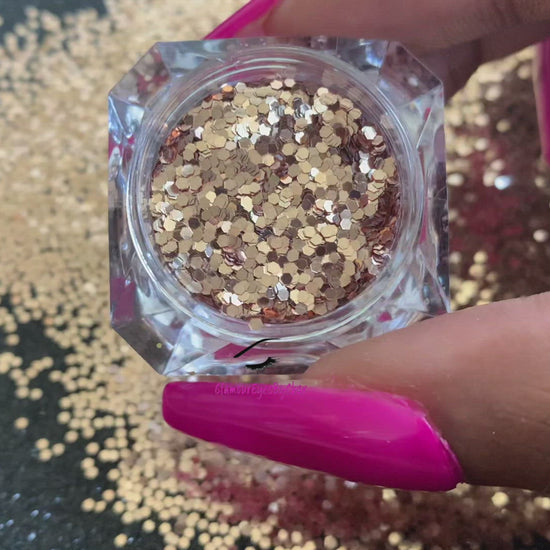 This glitter is called Pot of Gold and is part of the simple glitter collection. It consists of champagne gold glitter with a beautiful sparkle. Flake size is larger than fine and extra fine glitter. Blush can be used for your face, body, hair and nails. Comes in 5g jars only.