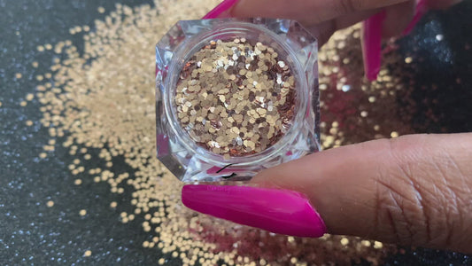 This glitter is called Pot of Gold and is part of the simple glitter collection. It consists of champagne gold glitter with a beautiful sparkle. Flake size is larger than fine and extra fine glitter. Blush can be used for your face, body, hair and nails. Comes in 5g jars only.