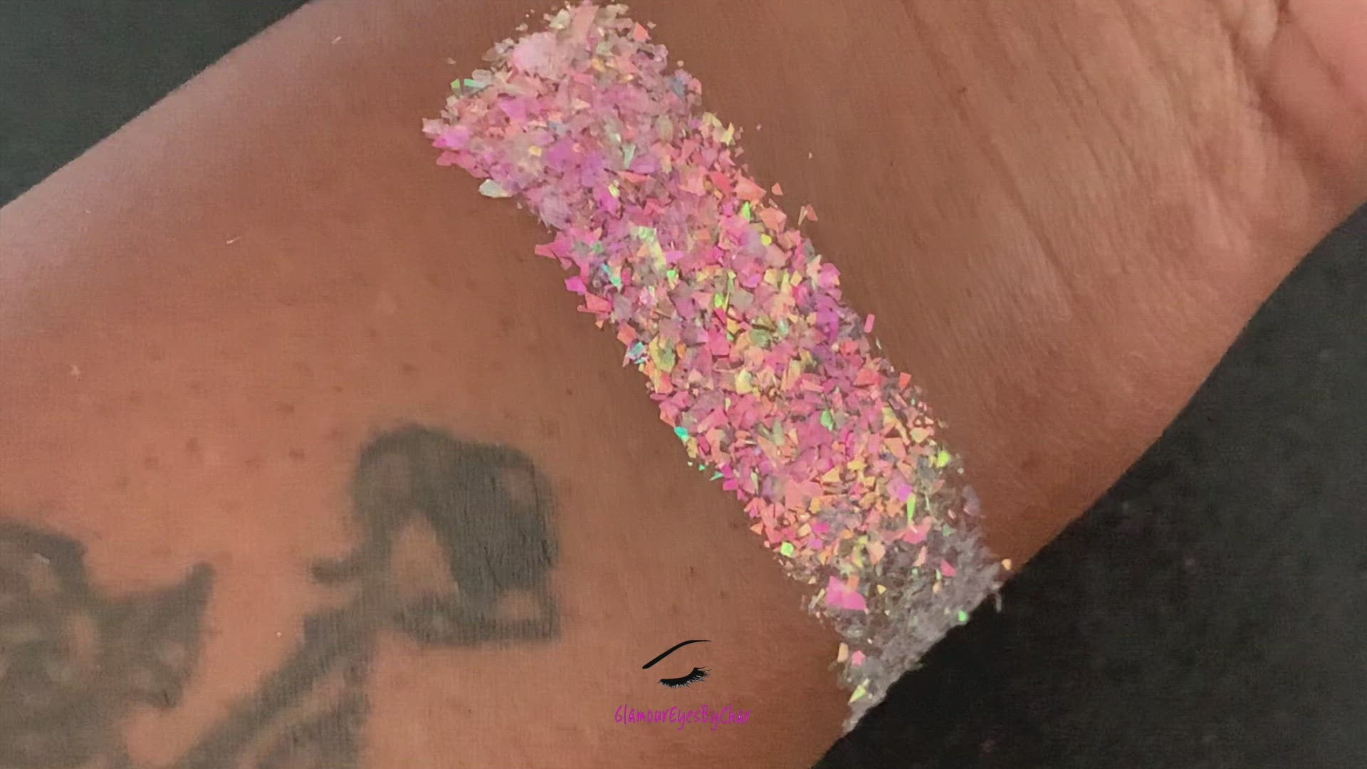 This glitter is called Pink Moscato and is part of the cellophane glitter flakes collection. It consists of white iridescent glitter shards with pink, green and golden reflects. Pink Moscato is perfect for body and nail art, glitter slime, resin art or DIY projects. Comes in 5g jars only.  