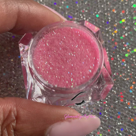 This glitter is called Pink Lemonade and is part of the simple glitter collection. It consists of soft baby pink glitter with an iridescent sparkle. Pink Lemonade can be used for your face, body, hair and nails. Comes in 5g jars only.