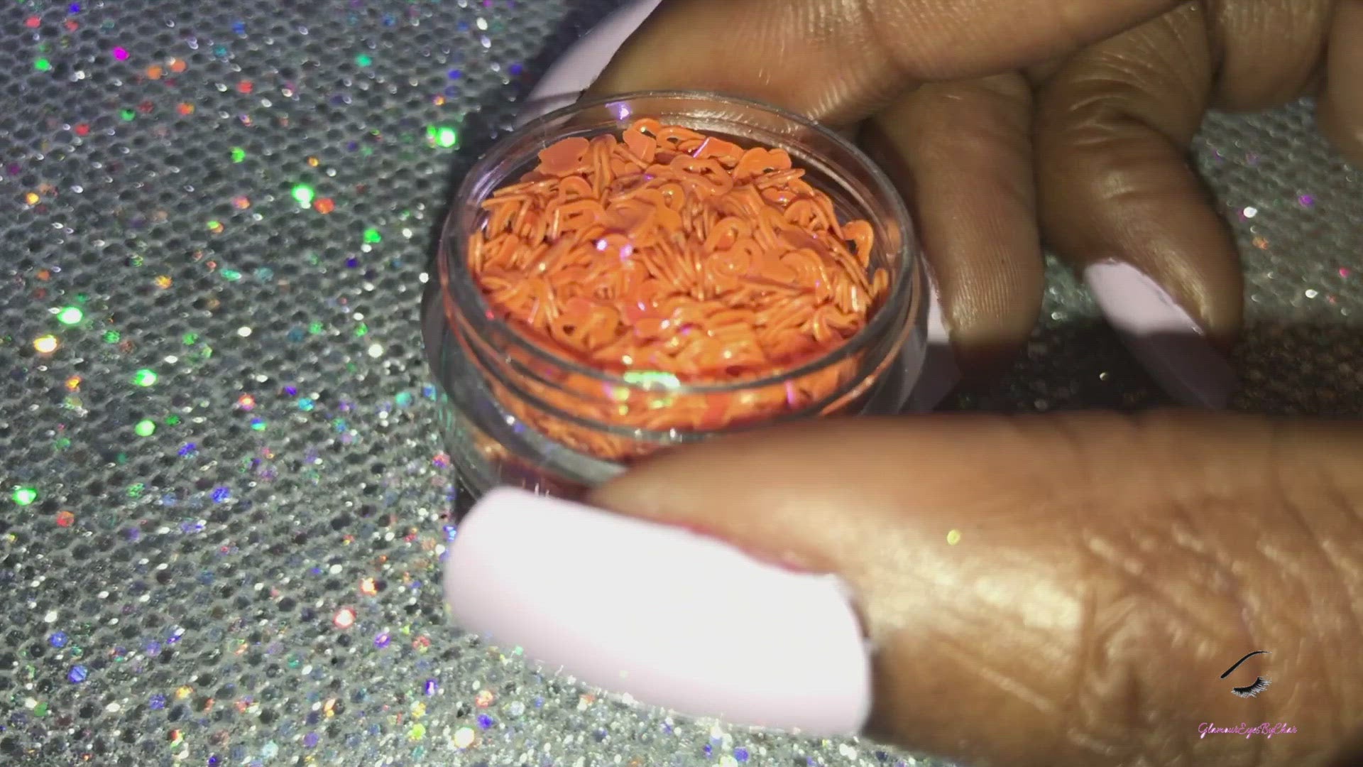 This glitter is called Orange Hearts and is part of the shaped glitters collection. It consists of orange small and large hearts with an iridescent sparkle. Orange Hearts is perfect for body and nail art or DIY projects. Comes in 5g jars only. **Glitter will be discontinued once sold out**