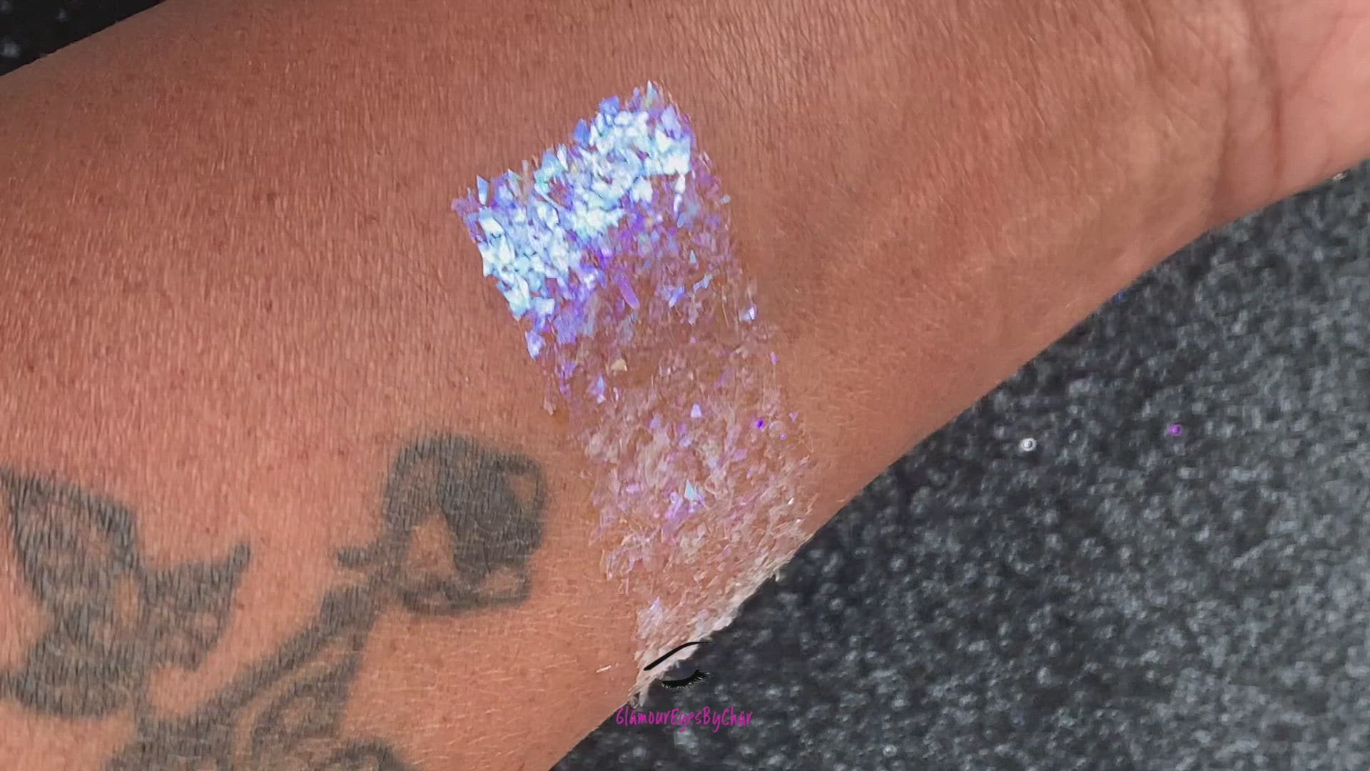 This glitter is called Angel's Kiss and is part of the cellophane glitter flakes collection. It consists of white iridescent glitter shards with purple reflects. Angel's Kiss is perfect for body and nail art, glitter slime, resin art or DIY projects. Comes in 5g jars only.