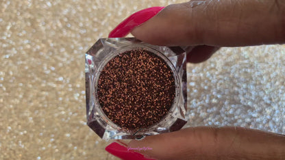 This glitter is called Melanin and is part of the simple glitter collection. It consists of chocolate brown metallic extra fine glitter.  Melanin can be used for your face, body, hair and nails. Comes in 5g jars only. 