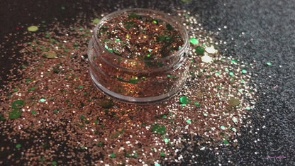 This glitter is called Halo and is part of the holiday collection.  It consists of emerald green and gold glitter. Halo can be used for your face, body, hair and nails.  Comes in 5g jars only.  