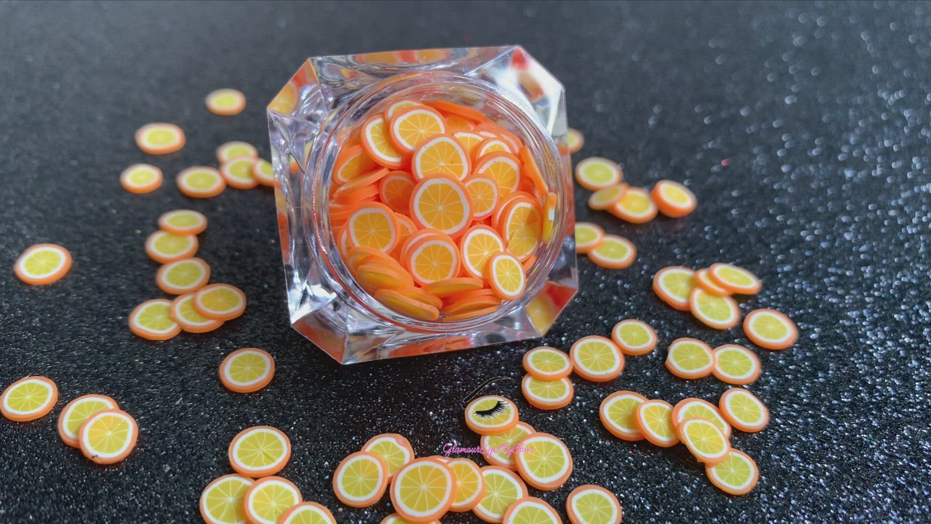 These Orange Fruit Slices are PERFECT for 3D nail or body art. They can also be used for a DIY craft project. The fruit slices are made of polymer clay and are approximately 3mm/0.12 inch in size. Comes in 5g jars only. Note: Orange Fruit Slices are not recommended for use in the immediate eye area. Tip: Apply some of our glitter to your nails to really GLAMOUREYES your look.
