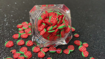 These Strawberry Fruit Slices are PERFECT for 3D nail or body art. They can also be used for a DIY craft project. The fruit slices are made of polymer clay and are approximately 3mm/0.12 inch in size. Comes in 5g jars only. Note: Strawberry Fruit Slices are not recommended for use in the immediate eye area. Tip: Apply some of our glitter to your nails to really GLAMOUREYES your look.