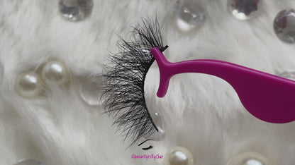 These 5D luxurious mink lashes are called Sassy and are 25mm in length. They are very dramatic, wispy, have a criss cross style, lightweight, and comfortable to wear on the lids. The thin lashband, makes the application process a breeze.  Sassy are suitable for dramatic eye looks and can be worn up to 25 times if handled with care. They are not for timid lash wearers.  Lashes come with a cute bag, and a mascara wand so that you can take care of these beauties.