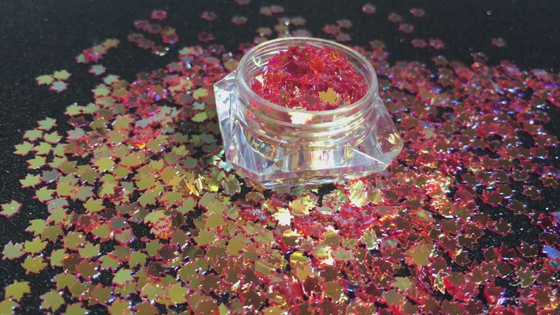 This glitter is called Warm Gold Maple Leafs and is part of the shaped glitters collection. It consists of warm red orange 4.0mm maple leafs with a gold sparkle. Warm Gold Maple Leafs is perfect for body and nail art or DIY projects. Comes in 5g jars only.