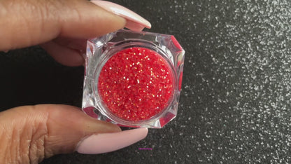 This glitter is part of the simple glitter collection. It consists of bright coral iridescent glitter. Coralina can be used for your face, hair, body, nail art and glitter slime. Available in 5g jars only.