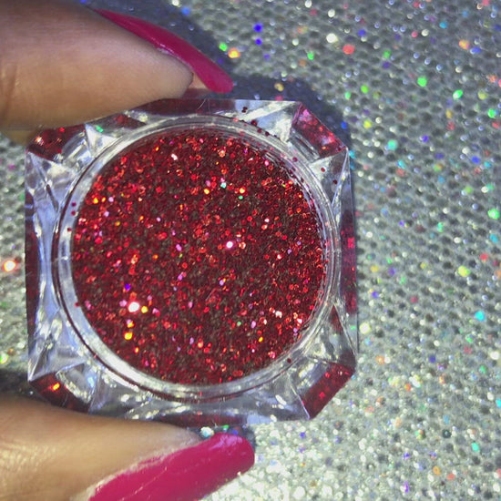 This glitter is called Candy Apple and is part of the simple glitter collection. It consists of a true candy apple red glitter. Candy Apple can be used for your face, body, hair and nails.