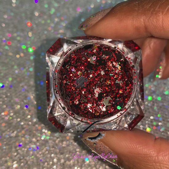 This glitter is called Raptors and is part of the super chunky glitter collection. It consists of ruby red, black, silver, and a touch of gold glitter with a holographic sparkle. If you’re a Toronto Raptors fan, this glitter is perfect for you. Your eyes will stand out in any crowd. Raptors can be used for your face, body, hair and nails. Comes in 5g jars only.