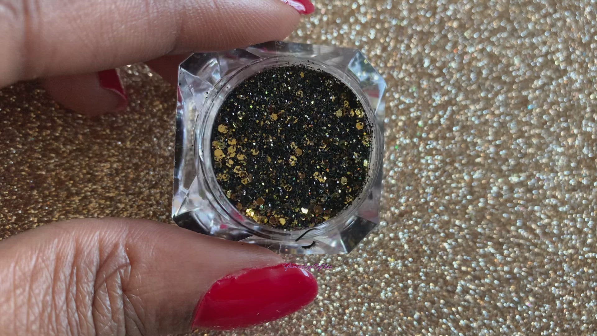 This glitter is called Elegance and is part of the chunky glitter collection. It consists of black and gold glitter with a holographic sparkle. Elegance can be used for your face, body, hair and nails. Comes in 5g jars only.