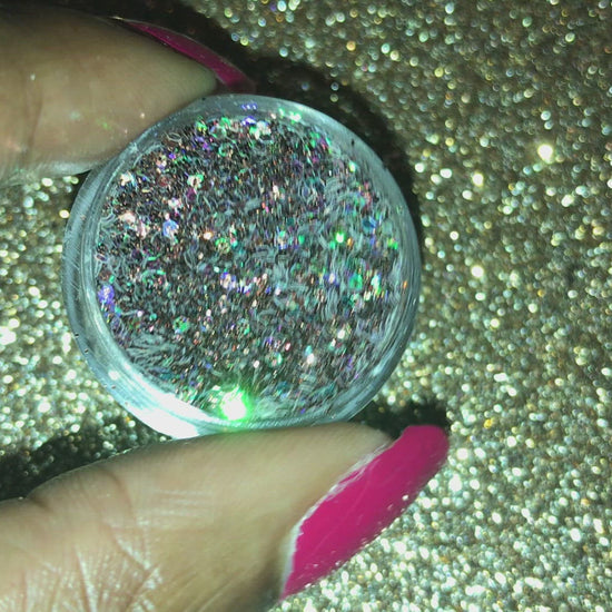 This glitter is called Fondue and is part of the chunky glitter collection. It consists of chocolate brown glitter with an iridescent sparkle. Fondue can be used for your face, body, hair and nails. Comes in 5g and 10g jars.  **Glitter will be discontinued once sold out**