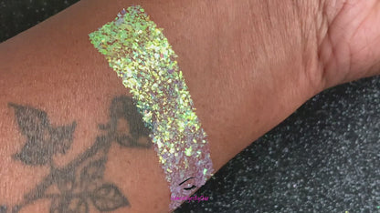 This glitter is called Sweet Lilac and is part of the cellophane glitter flakes collection. It consists of lilac purple iridescent glitter shards with green reflects. Sweet Lilac is perfect for body and nail art, glitter slime, resin art or DIY projects. Comes in 5g jars only.  