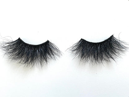 These 5D premium mink lashes are 25mm in length. They are wispy, lightweight, and comfortable to wear on the lids. The flexible cotton lash band, makes the application process a breeze. Baddie lashes are suitable for dramatic eye looks. They will definitely make your eyes pop, but are not for timid lash wearers. You can wear this reusable style up to 25 times if handled with care. Lashes come with a cute bag, and a mascara wand so that you can take care of these beauties.