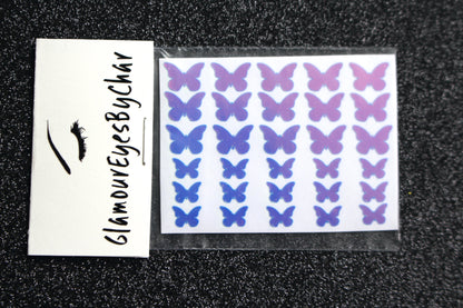 No need to go to the nail salon. Spice up your nails at home with these cute butterfly nail decals. They can be used on natural or acrylic nails. You can also apply them on top of regular or gel/shellac nail polish. These handmade decals can also be used for body art or any DIY project. Each pack contains 30 decals and is available in 5 different colours. The pack also includes 2 different sizes so that you can mix and match.  Tip: Apply some of our glitter on your nails to really GLAMOUREYES your look.