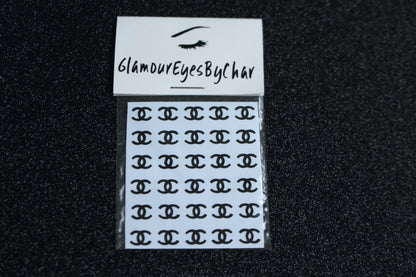 No need to go to the nail salon. Spice up your nails at home with these unique Chanel designer inspired nail decals. They can be easily used on natural or acrylic nails. You can also apply them on top of regular or gel/shellac nail polish. These handmade decals can also be used for body art or any DIY project. Each pack contains 30 decals and is available in 4 different colours.