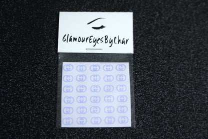 Spice up your nails with these unique GG designer inspired nail decals. They can be used on natural or acrylic nails. You can also apply them on top of regular or gel/shellac nail polish. These handmade decals can also be used for body art or any DIY project. The pack contains 30 decals and is available in 4 different colours.   Size: ﻿W= 0.3 inches, H= 0.22 inches  Tip: Apply some of our glitter on your nails to really GLAMOUREYES your look.