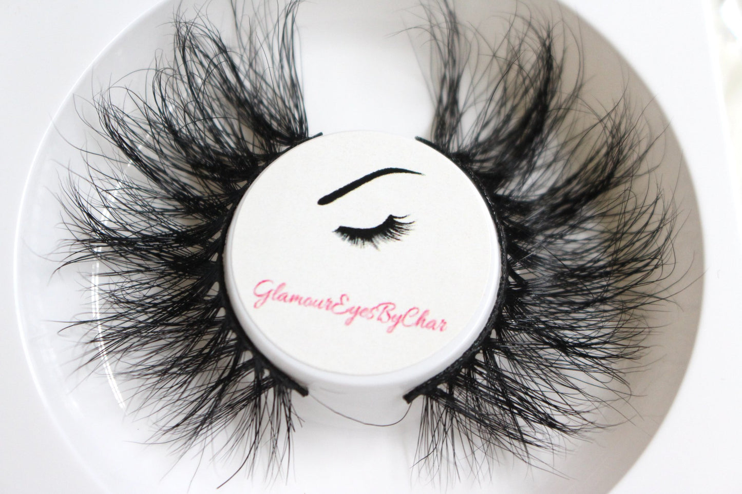 These 5D luxurious mink lashes are called Glamour and are 25mm in length. They are very dramatic, wispy, have a criss cross style flare effect, lightweight, and comfortable to wear on the lids. The thin lashband, makes the application process a breeze. 