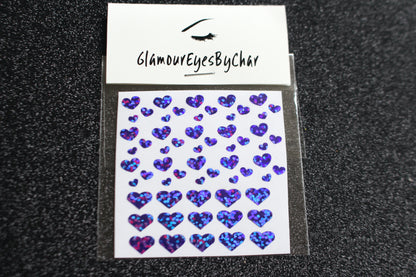 No need to go to the nail salon. Spice up your nails at home with these cute heart nail decals. They can be used on natural or acrylic nails. You can also apply them on top of regular or gel/shellac nail polish. These handmade decals can also be used for body art or any DIY project. Each pack contains 60 decals and is available in 4 different colours.  The pack also includes 4 different sizes so that you can mix and match.  Tip: Apply some of our glitter on your nails to really GLAMOUREYES your look.