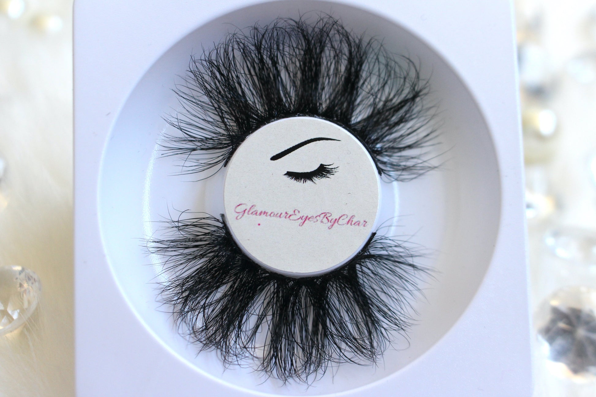 These 5D luxurious mink lashes are called Royalty and are 25mm in length. They are very dramatic, wispy, have a criss cross style, lightweight, and comfortable to wear on the lids. The thin lashband, makes the application process a breeze.  Royalty are suitable for dramatic eye looks and can be worn up to 25 times if handled with care. They will definitely make you feel like the goddess that you are but are not for timid lash wearers. 