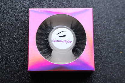 These 5D  premium mink lashes are 25mm in length. They are dramatic, fluffy lightweight, and comfortable to wear on the lids. They have a pop of silver glitter and colour to add an extra sparkle to your eyes. The flexible cotton lash band, makes the application process a breeze.  Stormy lashes are suitable for bold eye looks, and you can wear this reusable style up to 25 times if handled with care. They will definitely make your eyes pop, but are not for timid lash wearers. 