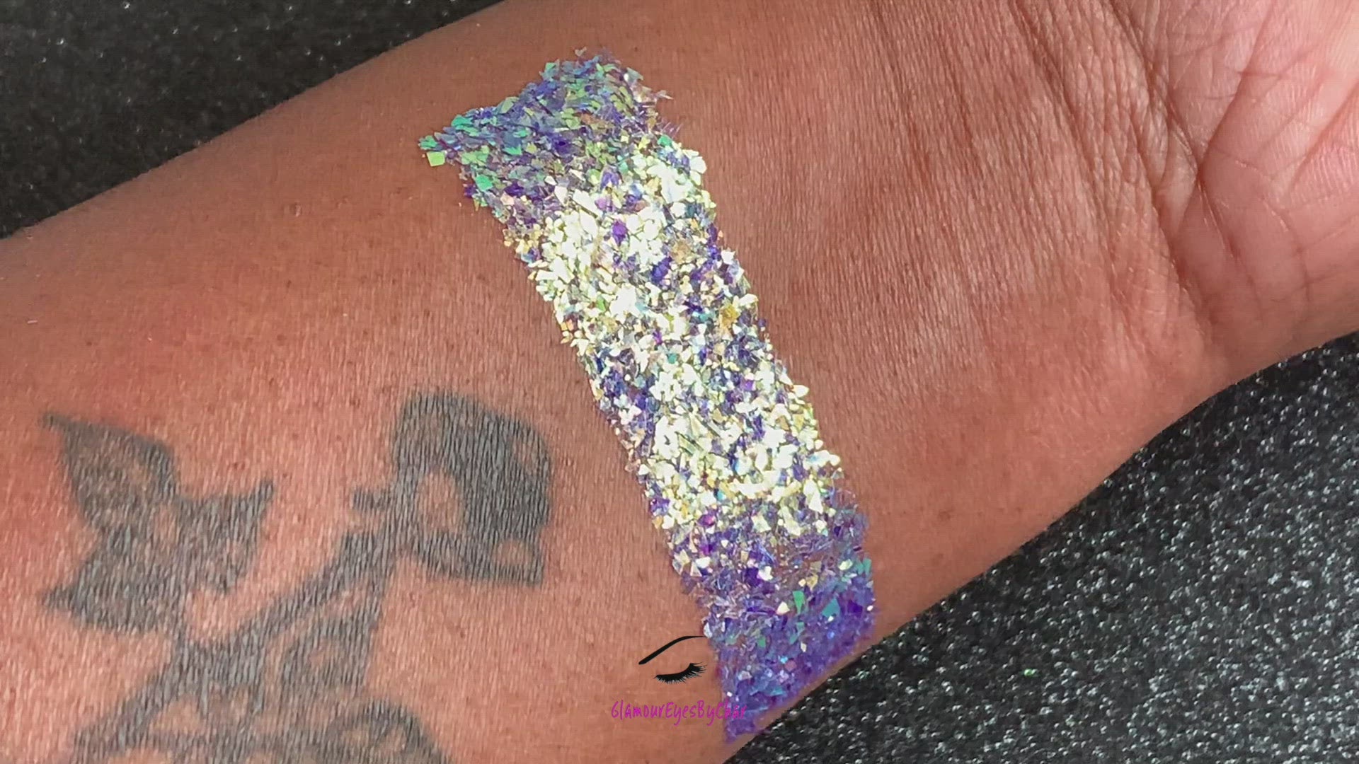 This glitter is called Grapetini and is part of the cellophane glitter flakes collection. It consists of purple iridescent glitter shards with green and golden reflects. Grapetini is perfect for body and nail art, glitter slime, resin art or DIY projects. Comes in 5g jars only.  