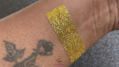 This glitter is called Gold Dust and is part of the simple glitter collection. It consists of true gold metallic glitter. Gold Dust can be used for your face, body, hair and nails. Available in 5g and 10g jars. 