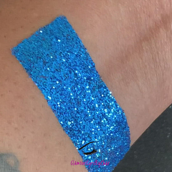 This glitter is called Blue Magic and is part of the simple glitter collection. It consists of blue metallic glitter.  Blue Magic can be used for your face, body, hair and nails. Comes in 5g and 10g jars. 