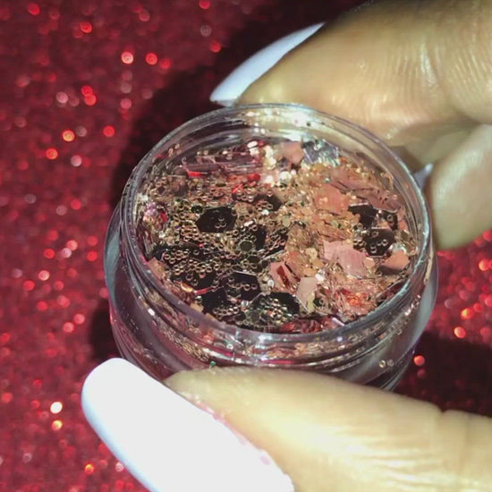 This glitter is called Rosé and is part of the super chunky glitter collection. It consists of rose gold and champagne glitter and has a dazzling sparkle.  Rosé can be used for your face, body, nails and hair. Comes in 5g and 10g jars.