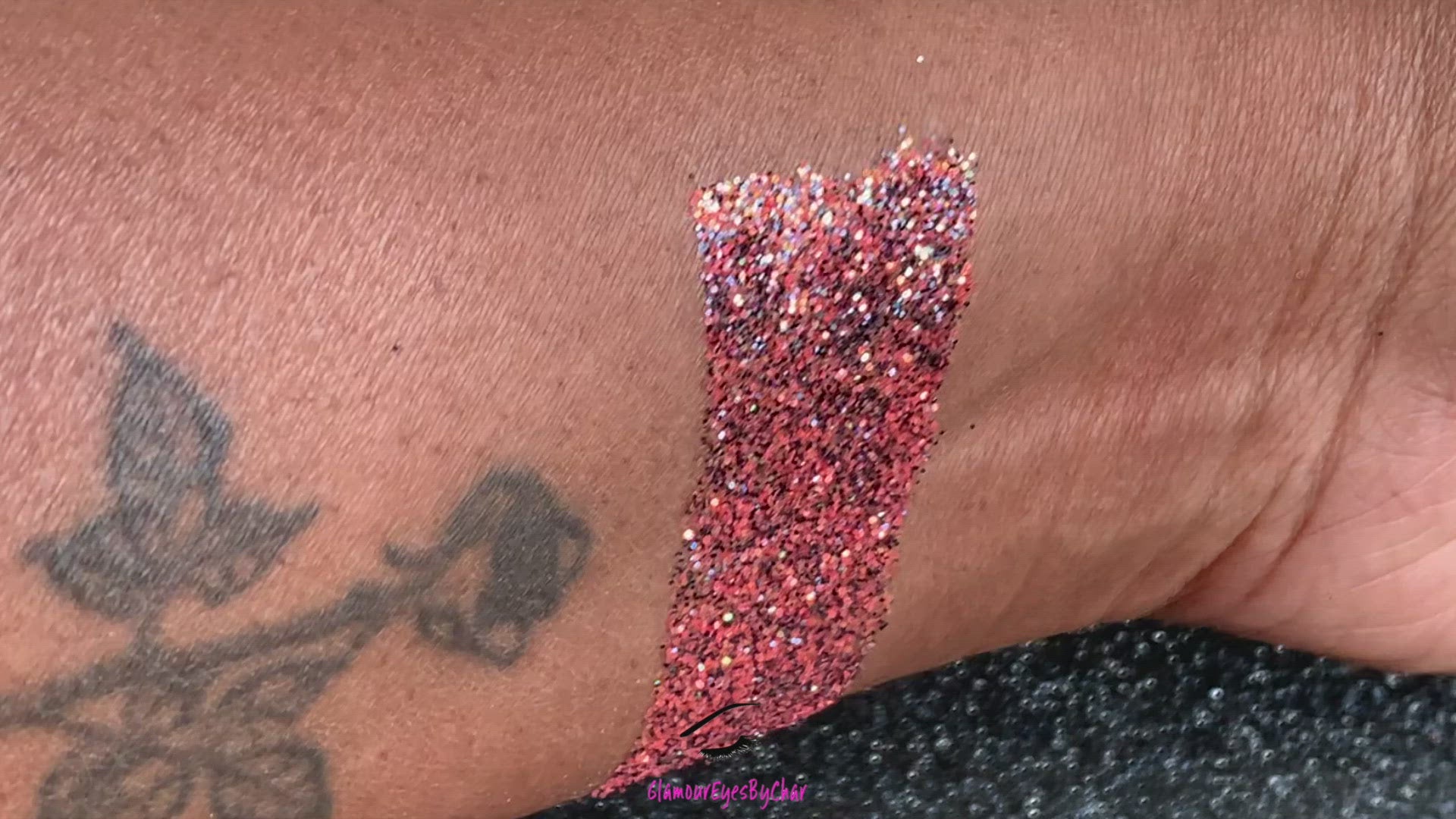 This glitter is called Spooky Season and is part of the Halloween glitter collection. It consists of iridescent bright coral with a touch of black holographic glitter. Spooky Season can be used for your face, body, hair and nails.   Comes in 5g jars only. 