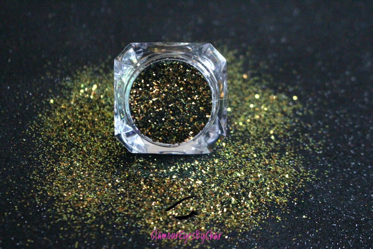 This glitter is part of the simple glitter collection. It consists of olive green glitter that reflects gold. Beautiful Nightmare can be used for your face, hair, body, nail art and glitter slime. Available in 5g jars only.  Heat resistant 