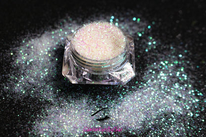 This glitter is called Bride to Be and is part of the simple glitter collection. It consists of white glitter with an iridescent sparkle.  Bride to Be can be used for your face, body, hair and nails. Comes in 5g jars only.