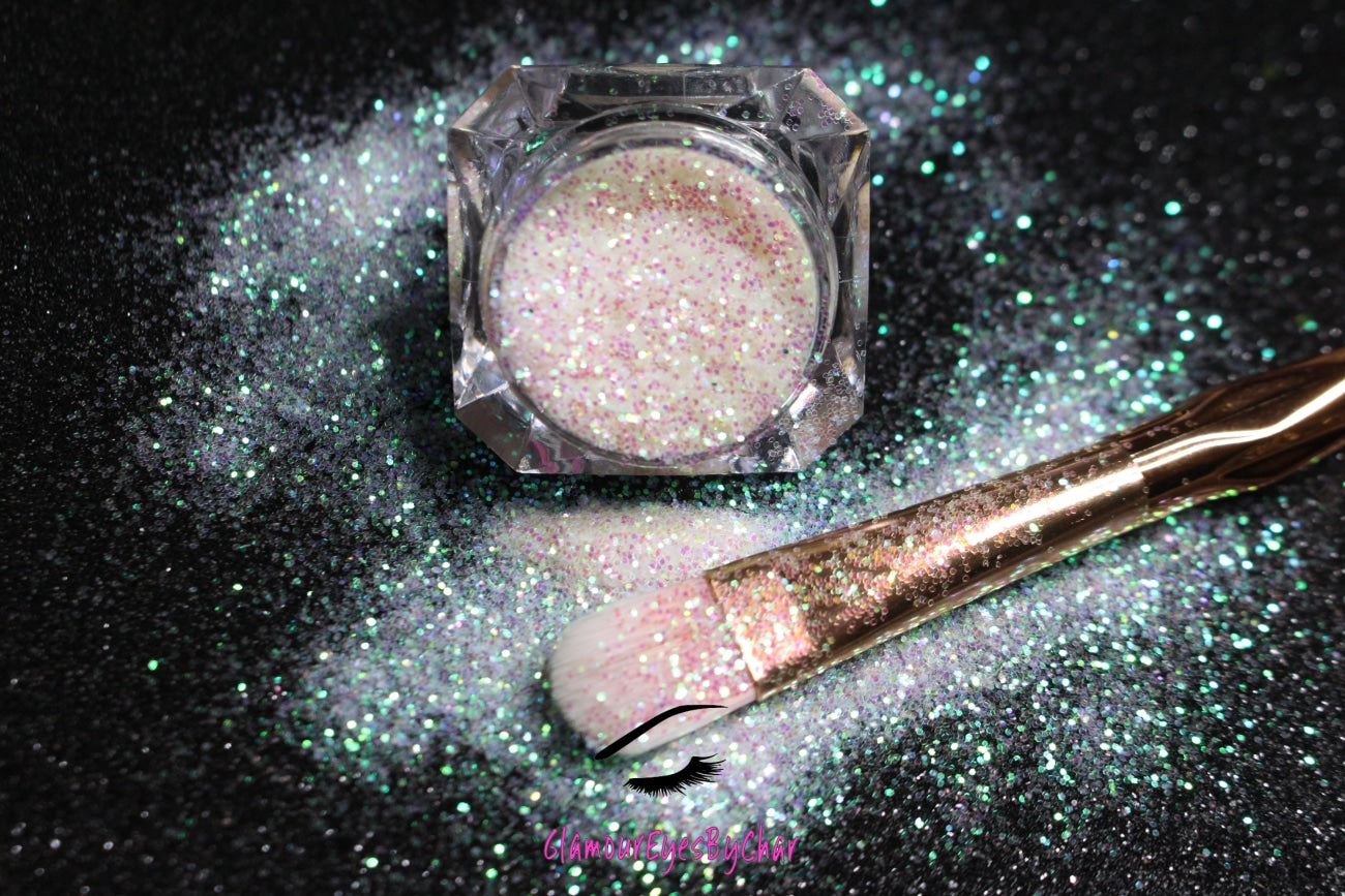 This glitter is called Bride to Be and is part of the simple glitter collection. It consists of white glitter with an iridescent sparkle.  Bride to Be can be used for your face, body, hair and nails. Comes in 5g jars only.