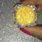 This glitter is called Lemon Drops and is part of the simple glitter collection. It consists of bright yellow glitter with an iridescent sparkle. Flake size is larger than fine and extra fine glitter. Lemon Drops can be used for your face, body, hair and nails.