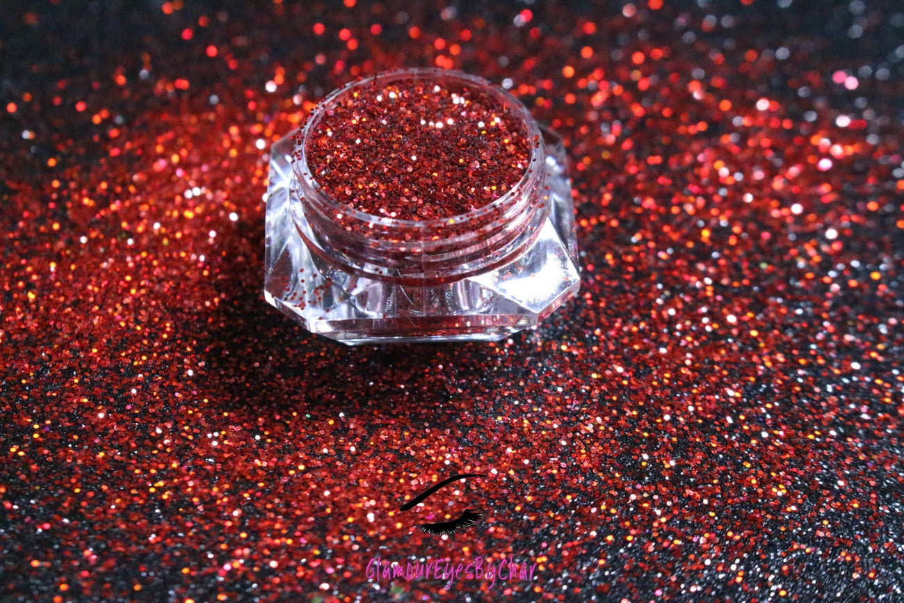 This glitter is called Candy Apple and is part of the simple glitter collection. It consists of a true candy apple red glitter.  Candy Apple can be used for your face, body, hair and nails.
