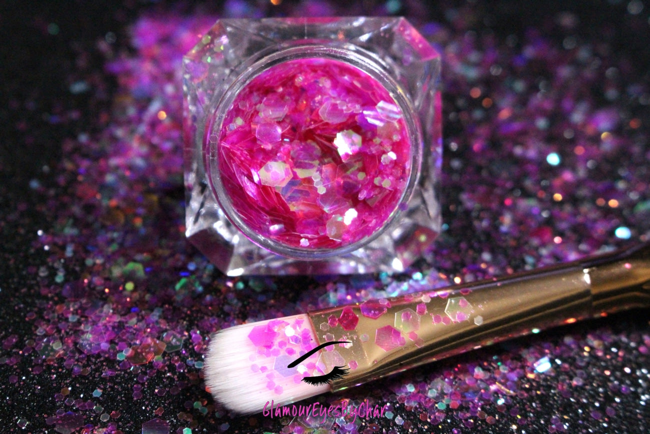 This glitter is called Candy Shop and is part of the super chunky glitter collection.  It consists of fuchsia glitter with an iridescent sparkle. Candy Shop can be used for your face, body, hair and nails.