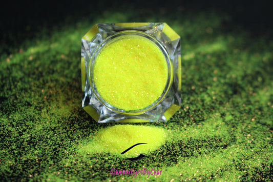 This glitter is called Caution and is part of the simple glitter collection. It consists of vibrant neon yellow iridescent glitter that reflects an orange, gold and green sparkle. Caution can be used for your face, body, hair and nails. Comes in 5g jars only.  