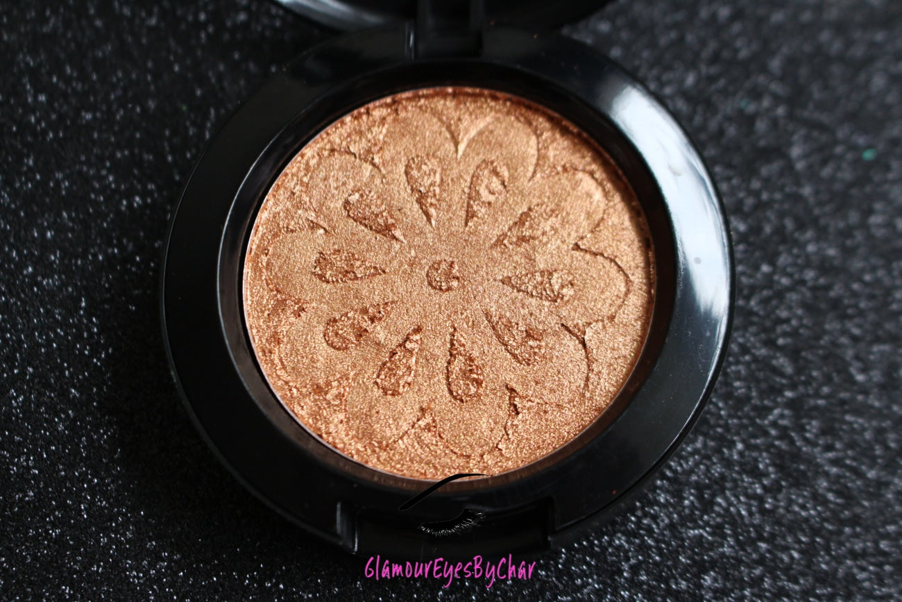  Cleopatra Glamlighter is a copper, gold shade and can be applied as a highlighter or an eyeshadow.   Our handmade pressed glamlighter powder is vegan, pigmented, and silky smooth. It glides right on your skin for an eye catching luminous glow. The buttery formula builds and blends seamlessly without ever looking glittery.