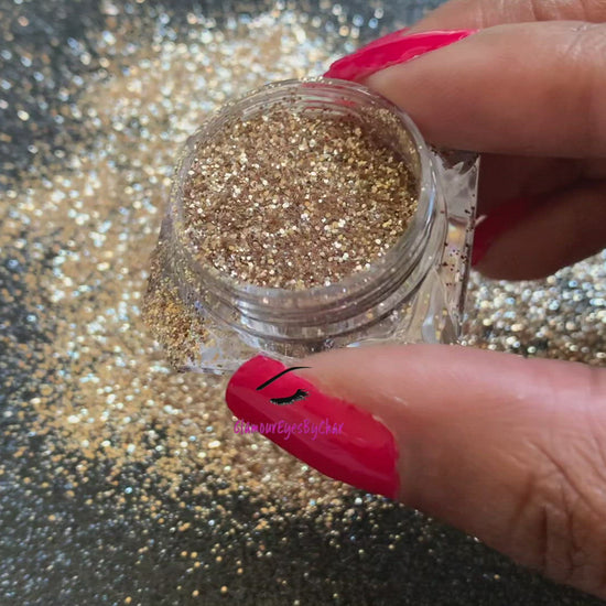 This glitter is called Exquisite and is part of the simple glitter collection. It consists of dark champagne and pale gold glitter with a metallic sparkle. Exquisite can be used for your face, body, hair and nails. Comes in 5g jars only. 
