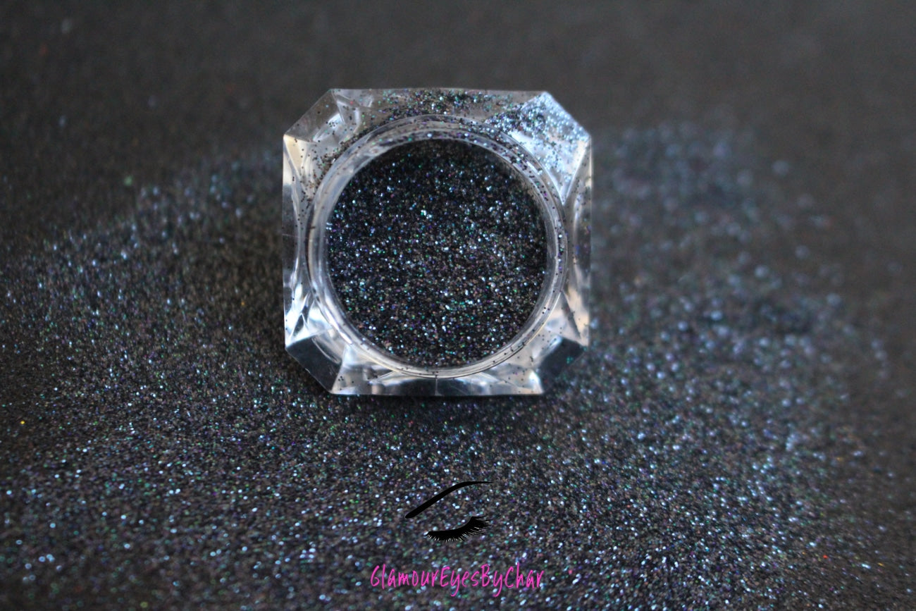 This glitter is called Dark Skies. It consists of holographic black glitter. Dark Skies can be used for your face, hair, body and nail art, glitter slime, resin art, tumblers, crafts, and DIY projects.  Premium glitter Heat resistant Material: Non-toxic polyester (PET) Size: Extra fine  *Glitter is sold by weight of 2oz in resealable bag*  