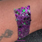 This premium glitter is part of the Halloween glitter collection. It consists of emerald green, dark purple, and black glitter with a metallic sparkle.  Witch's Brew can be used for your face, hair, body, nail art and glitter slime. Available in 5g jars only.