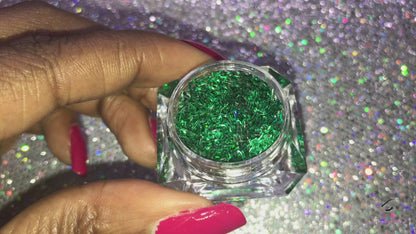 This glitter is called Green Stars and is part of the shaped glitters collection. It consists of emerald green small and large stars. Green Stars is perfect for body and nail art or DIY projects. Comes in 5g jars only. **Glitter will be discontinued once sold out**