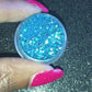 This glitter is called Caribbean Sea and is part of the chunky glitter collection. It consists of aqua blue metallic glitter and has a dazzling sparkle. Caribbean Sea can be used for your face, body, hair and nails. Comes in 5g and 10g jars. 