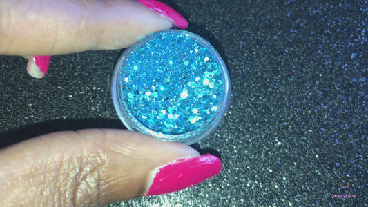 This glitter is called Caribbean Sea and is part of the chunky glitter collection. It consists of aqua blue metallic glitter and has a dazzling sparkle. Caribbean Sea can be used for your face, body, hair and nails. Comes in 5g and 10g jars.
