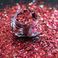 This glitter is called Fireworks and is part of the super chunky glitter collection.  It consists of garnet red and silver glitter with a dazzling holographic sparkle. Fireworks can be used for your face, body, hair and nails.  Comes in 5g jars only. **Glitter will be discontinued once sold out**