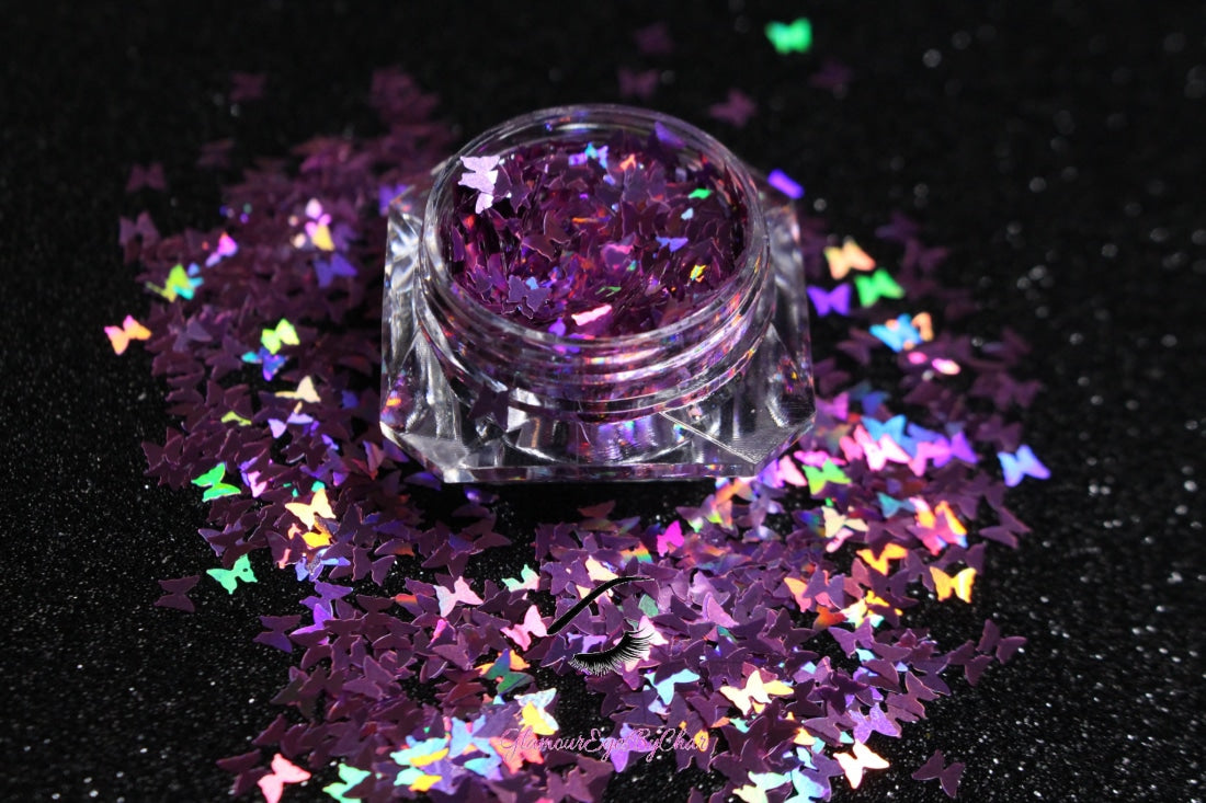This glitter is called Holographic Purple Butterflies and is part of the shaped glitters collection. It consists of purple 3.0mm butterflies with a holographic sparkle. Holographic Purple Butterflies is perfect for nail and body art.