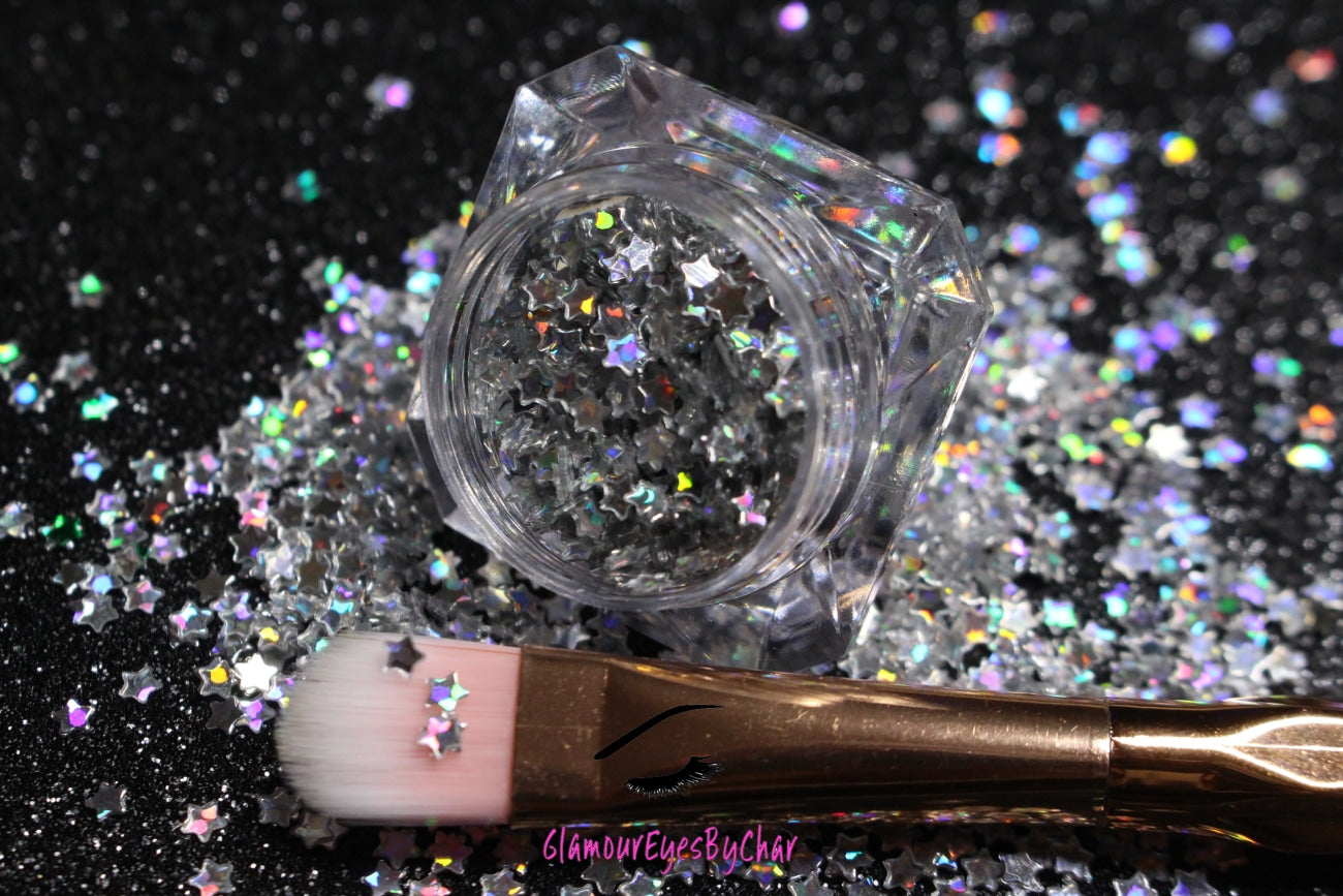 This glitter is called Holographic Silver Stars and is part of the shaped glitters collection.  It consists of silver small stars with a holographic sparkle. Holographic Silver Stars can be used for your face, body, hair and nails.